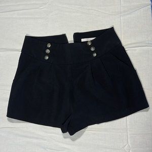 Have 6 button shorts, size small